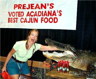 A stuffed alligator guards the door at Prejean’s Restaurant.